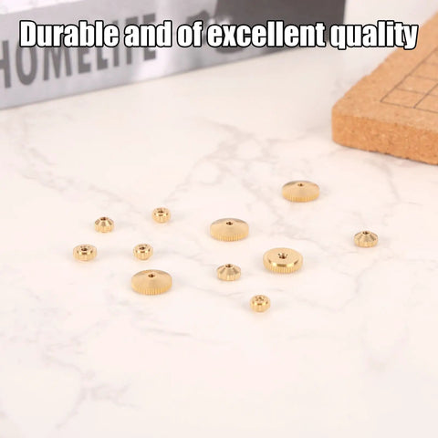 Brass Clock Hand Nut Kit With 12 Pieces In 5mm 6mm And 10mm OD Sizes Replacement Set displayed on a marble surface