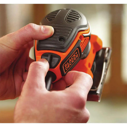 Powerful Two Point Zero Amp Orbit Sander in use showing soft paddle switch and ergonomic design for one hand use