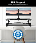 Dual Monitor Standing Desk Converter With 36 Inch Wide Surface Height Adjustable Riser Manual Lift Gas Spring Built In Two Monitor Mounts Sit Stand Desk Converter For Two Screens Up To 32 Inches Black on white desk