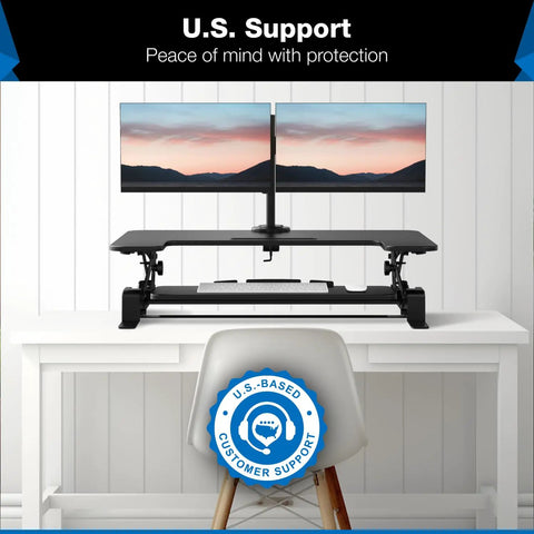 Dual Monitor Standing Desk Converter With 36 Inch Wide Surface Height Adjustable Riser Manual Lift Gas Spring Built In Two Monitor Mounts Sit Stand Desk Converter For Two Screens Up To 32 Inches Black on white desk