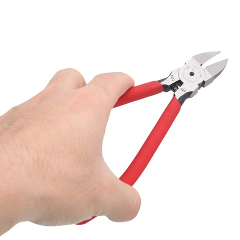 Heavy Duty Wire Stripper And Diagonal Pliers Automatic Stripping, hand holding red pliers with narrow jaws for electrical tasks.
