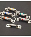 Rock Solid DC 450V Electric Car Fuse 50 Amp High Voltage Circuit Breaker multi-colored fuses on black background.