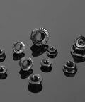 M6 X 1.0Mm Serrated Flange Hex Lock Nuts 100 Piece Pack 304 Stainless Steel showing various sizes and designs on a reflective surface.