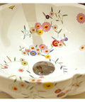 Handmade Ceramic Vessel Sink With Snazzy Floral Patterns For Above Counter Vanity Basins In Fresh Modern Bathrooms White Flower Wash Bowl Featuring Slick Glazed Finish, showing colorful floral designs.