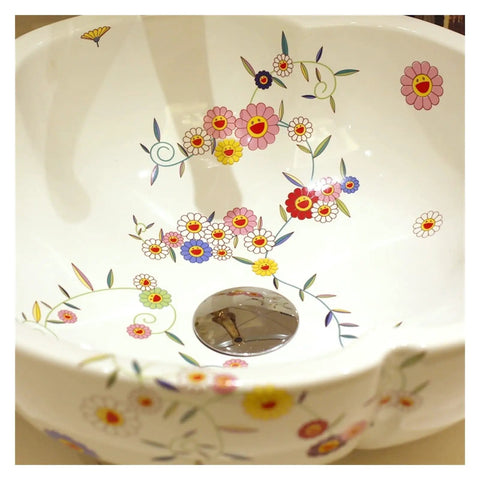 Handmade Ceramic Vessel Sink With Snazzy Floral Patterns For Above Counter Vanity Basins In Fresh Modern Bathrooms White Flower Wash Bowl Featuring Slick Glazed Finish, showing colorful floral designs.