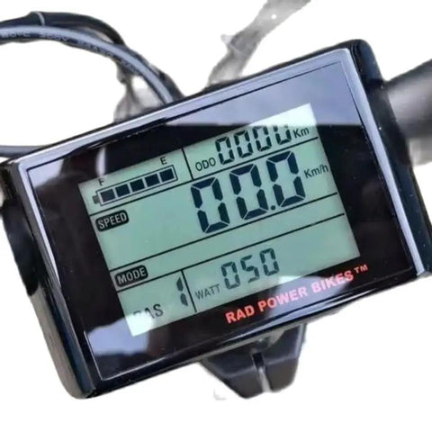 Close-up of Waterproof LCD Bike Display And Computer For 48V Ebikes with speed and mileage tracker on black casing
