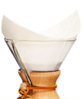 Square Bonded Coffee Filters 100 Count Exclusive Packaging For Ultra Clean Extraction And Rich Brew in glass brewer