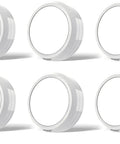 Six white puck lights with remote control, battery powered for under cabinet and counter lighting, six pack, easy setup, energy efficient.