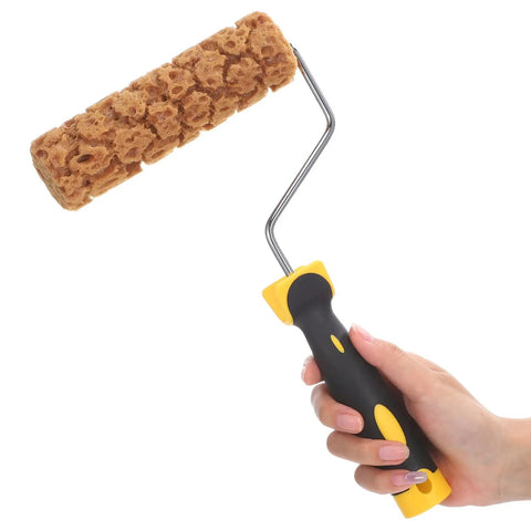 Pineapple Texture Sponge Paint Roller for Walls Gives Your Home a Major Glow Up with This DIY Decor Tool held in hand.