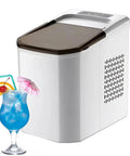 No Sweat Countertop Bullet Ice Cube Maker With 1.1 Liter Tank Drops Fresh Ice In Just 8 Minutes, shown with a blue cocktail.
