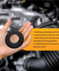 Premium Polyurethane Silencer Pad And Suspension Bushing Damper held in hand, black strut mount washer for shock absorption.
