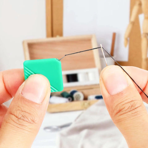 Hands using 10 Pack Automatic Needle Threaders for Sewing Machines Self Threading Tool for Embroidery Floss Hand Sewing and Cross Stitch