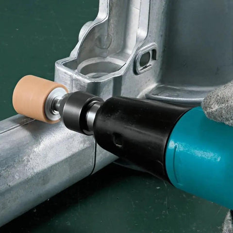 Heavy Hitter Quarter Inch Compact Die Grinder 28000 Rpm High Speed Rotary Tool shaping metal with a sanding drum attachment.