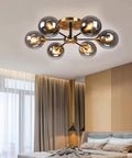 Mid Century Glass Orb Chandelier With Brass Finish Semi Flush Ceiling Light With Radial Design Six Light Fixture in bedroom