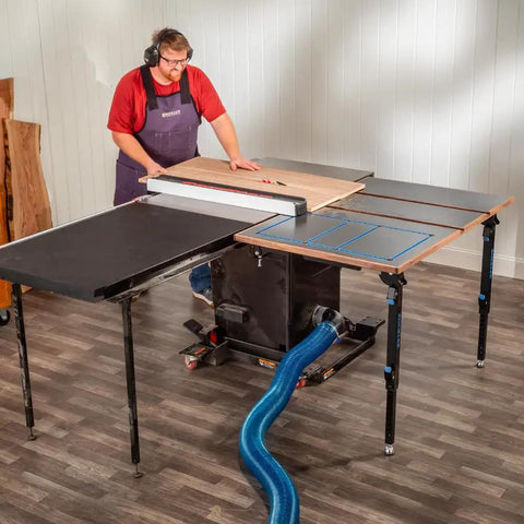 Folding Table Saw Outfeed Kit With Adjustable Height Legs And Foldable Steel Frame For Easy Storage in workshop setup.