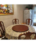 Solid Wood Lazy Susan Turntable Round Rotating Serving Tray For Kitchen And Dining Table on a round table with lace tablecloth.