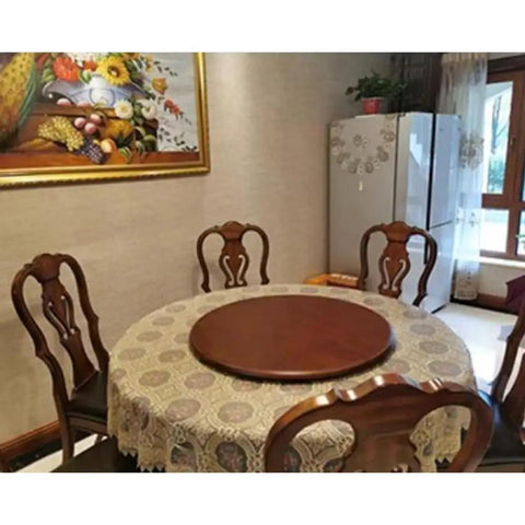 Solid Wood Lazy Susan Turntable Round Rotating Serving Tray For Kitchen And Dining Table on a round table with lace tablecloth.