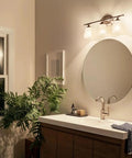 Bathroom with Ansonia 23-Inch Three Light Vanity Fixture with Satin Etched Glass and Brushed Nickel Finish, modern style.