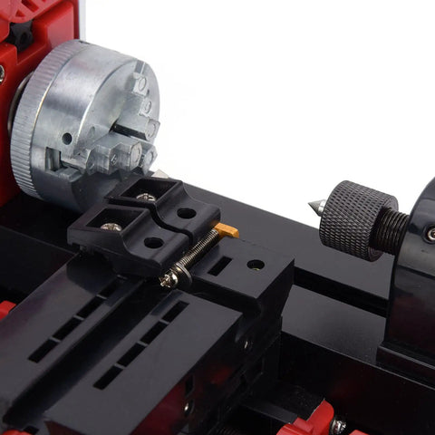 Close-up of Yduupxe Mini Metal Lathe Machine 20K RPM showing precision parts for metal and wood turning.
