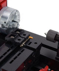 Close-up of Top Shelf Mini Metal Lathe Machine With Beefy 24w Motor and precision tool clamp for woodworking use.