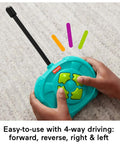 Child holding remote of My Easy RC Remote Control Car For Kids 3 And Up With Two Speeds Simple Four Way Driving One Button Drive