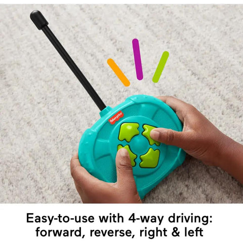 Child holding remote of My Easy RC Remote Control Car For Kids 3 And Up With Two Speeds Simple Four Way Driving One Button Drive