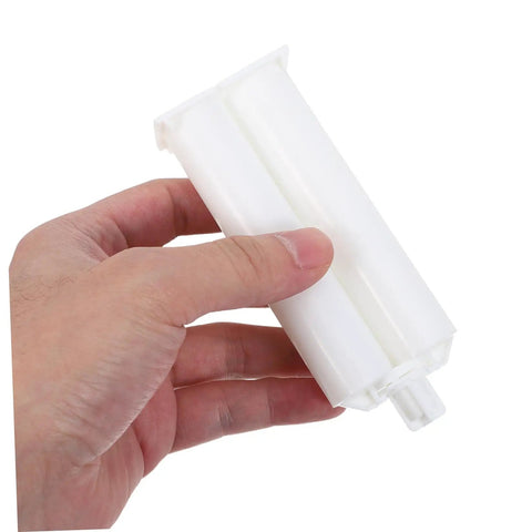 Hand holding Dual AB Epoxy Cartridge Dispenser For Construction And Outdoor Repairs, 1 To 1 Ratio, Manual Glue Applicator With Reliable Flow Control, Portable Tube Work Kit For Pros And DIY Projects, 50ml