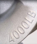 Close-up of 4000 lb capacity marking on Heavy Duty 6 Inch Hook Type Cable Sheave With Welded Steel Frame For Tough Jobsite Use