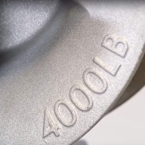 Close-up of 4000 lb capacity marking on Heavy Duty 6 Inch Hook Type Cable Sheave With Welded Steel Frame For Tough Jobsite Use
