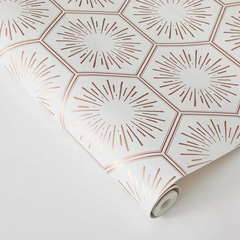 Roll of Metallic Autumn Bronze Hello Sunshine Peel And Stick Wallpaper showing honeycomb geometric design with metallic accents.