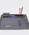 Magnetic Repair Work Mat For Soldering And Electronics Premium Silicone Soldering Mat That Works Like A Champ On Your Workbench Up To 932F Ideal For Soldering Iron BGA Computer And Phone Repair Grey 17.72 By 11.81 Inches with tools and components display.