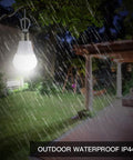 Off Grid Solar Light With Dual LED Bulbs And Solar Panel Pendant in outdoor rain demonstrating IP44 waterproof feature