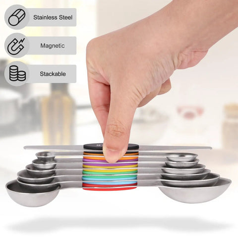 Hand holding Magnetic Dual Sided Stainless Steel Measuring Spoons Set 7 Piece With Leveler for compact nesting and rustproof design.