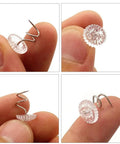 200 Piece Heavy Duty Transparent Plastic Spiral Bed Skirt Pins And Furniture Fabric Holders With Killer Grip And No Fuss Setup For Upholstery Jobs And Total Home Refresh Vibe, showing spiral pins in hand.