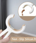 Close-up of a 12 Pack Heavy Duty Plastic Clothes Pins Featuring Anti Rust Springs And Non Slip Silicone Pads showing grip pad.