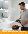 Heavy Duty Handheld Steam Cleaner Generating Scalding 2500W Heat cleaning bathroom tile, releasing steam from nozzle.