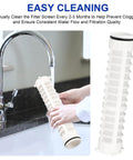 Hands cleaning Go To Spin Down Sediment Filter One And A Half Inch 60 Mesh Replacement under faucet, demonstrating easy maintenance