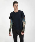 Gonna Need These Badass Arm Sleeves Featuring Heavy Duty Sun Block And Thorn Proof Shielding Hella Comfy Fingerless Design For Tough Yard Work Or Trail Runs Moisture Wicking Daily Driver worn by a male model with tattoos.