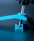 Close-up of Blue T Track Clamps For Woodworking Set Of 4 Hold Down Clamps With 5 Inch Length And T Slot Bolts in action.