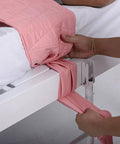 Chenhon Criss Cross Chest Vest Restraint Secure Patient Safety For Bed Or Chair Use Adjustable Elastic Cotton Fabric shown on a bed.