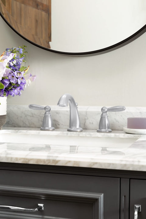 Oil-Rubbed Bronze Two-Handle Widespread Bathroom Faucet Trim Kit For 3-Hole Deck Mount Adjustable 8 To 16 Inch Spread Requires Valve 9000 Brantford Style T6620ORB installed on a marble sink