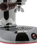 Straight Fire Manual Lever Espresso Machine With Heavy Duty Rosewood Handles, Classic Chrome Brass Finish, Bottomless Portafilter detail view of chrome base and pull handles.
