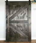 Top Shelf Ebony Black Oil Wood Stain For Patios And Decks Hella Durable Penetrating Formula That Gonna Make Your Wood Look Sick With A Smooth Matte Black Finish And Tough Protection on a barn door.