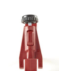 Tile Leveling Pliers Gun for Leveling System close-up, red adjustable tool with black knob, for wall and floor spacers.