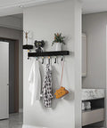 Heavy Duty Wall Mounted Coat Rack Featuring Solid Cast Iron Hooks And Decorative Cat And Dog Motifs Killer Modern Style For Entryway Organization Heavy Duty Hallway Storage Game Changer with hooks and decorative items.