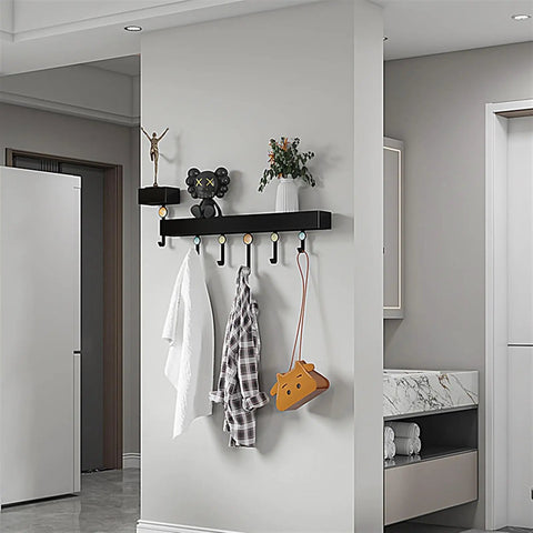 Heavy Duty Wall Mounted Coat Rack Featuring Solid Cast Iron Hooks And Decorative Cat And Dog Motifs Killer Modern Style For Entryway Organization Heavy Duty Hallway Storage Game Changer with hooks and decorative items.