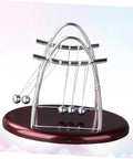 Large Pendulum Balance Balls Newtons Cradle For Desk Decor And Hands On Physics Fun, metal frame on oval base.