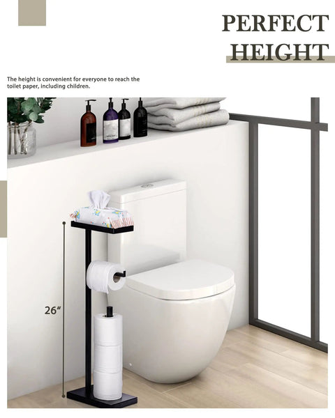 Matte Black Free Standing Toilet Paper Holder With Shelf beside toilet, stores 4 rolls, 26-inch tall with tissues on top.