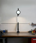 Heavy Duty Long Arm Machine Work Light, 18W LED With Multi-Joint Adjustable Design on a workshop table.