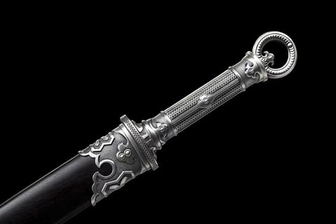 Close-up of Ring Pommel Song Dao Hand Forged High Manganese Steel Blade With Rosewood Scabbard And Exclusive Alloy Fittings.